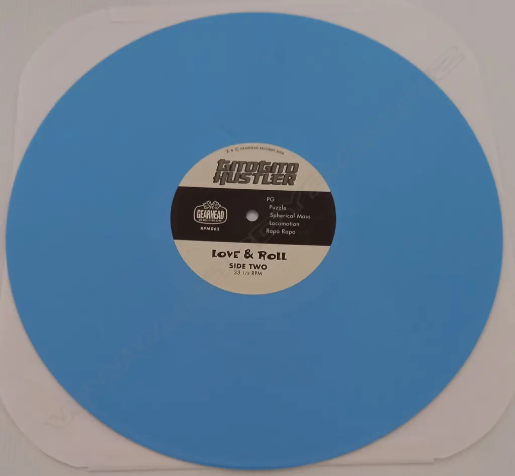 Gitogito Hustler, Love & Roll (teal blue vinyl) Image 1++